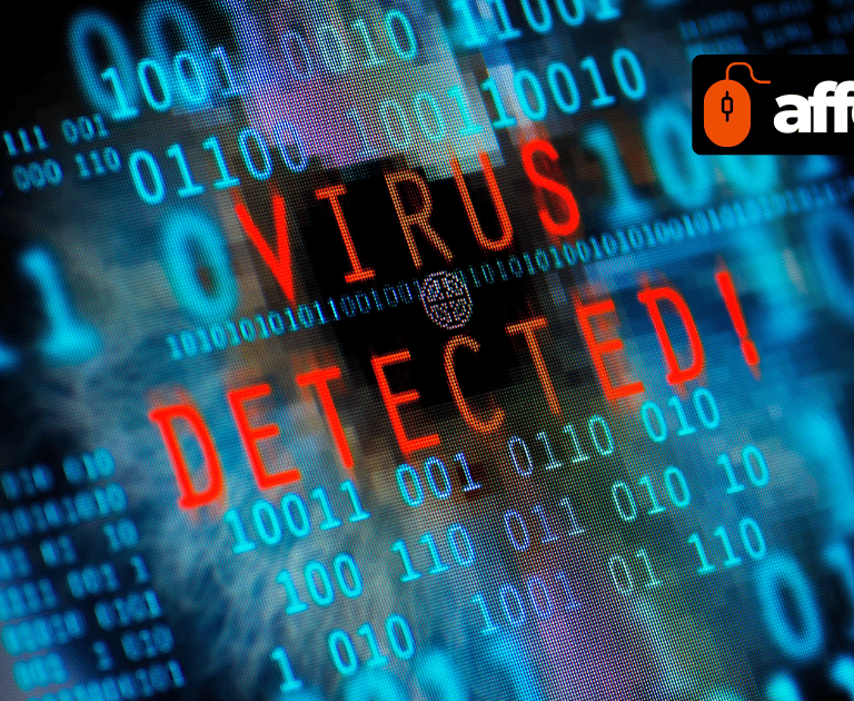 Digital binary code screen displaying a red virus detected warning for cybersecurity protection.