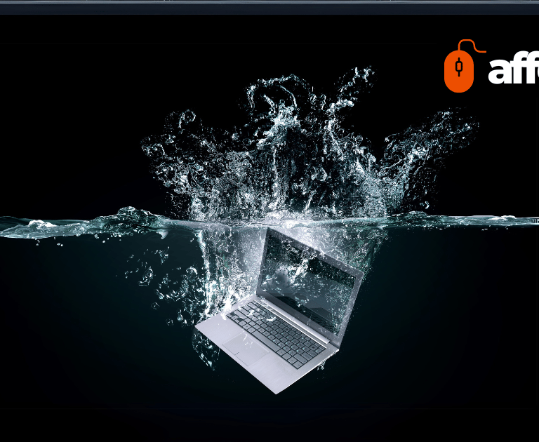 A silver laptop splashes into dark water with the affordIT logo displayed above.