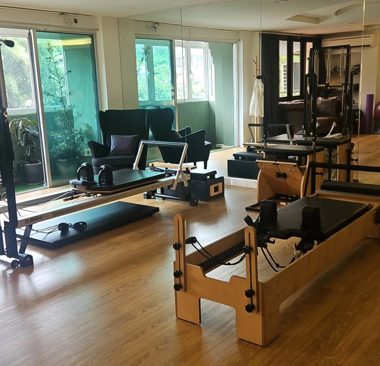 Fully equipped Pilates studio interior with reformers at The Pilates Room Bangsar