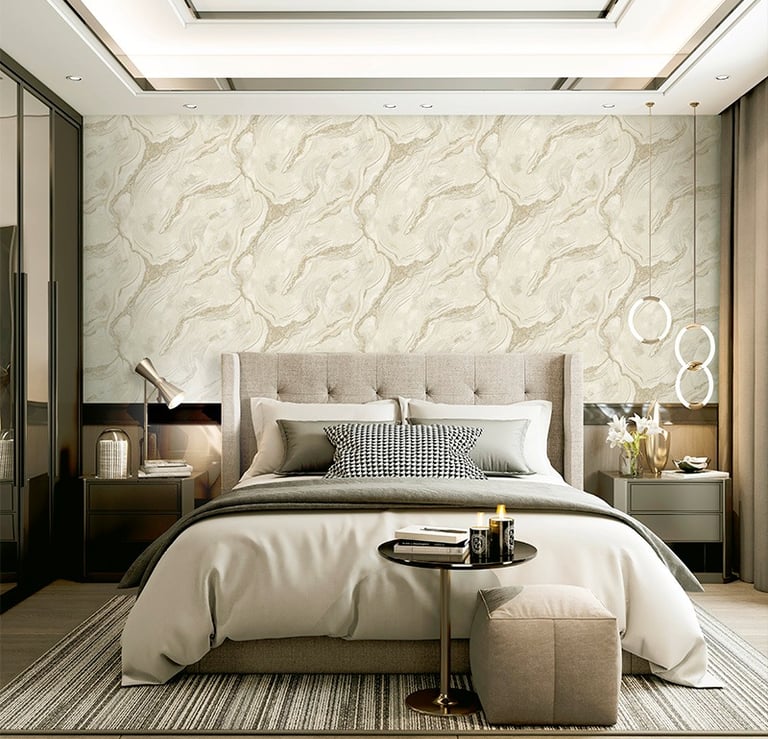 Luxury bedroom featuring beige marble wallpaper, a tufted headboard, and modern pendant lighting.