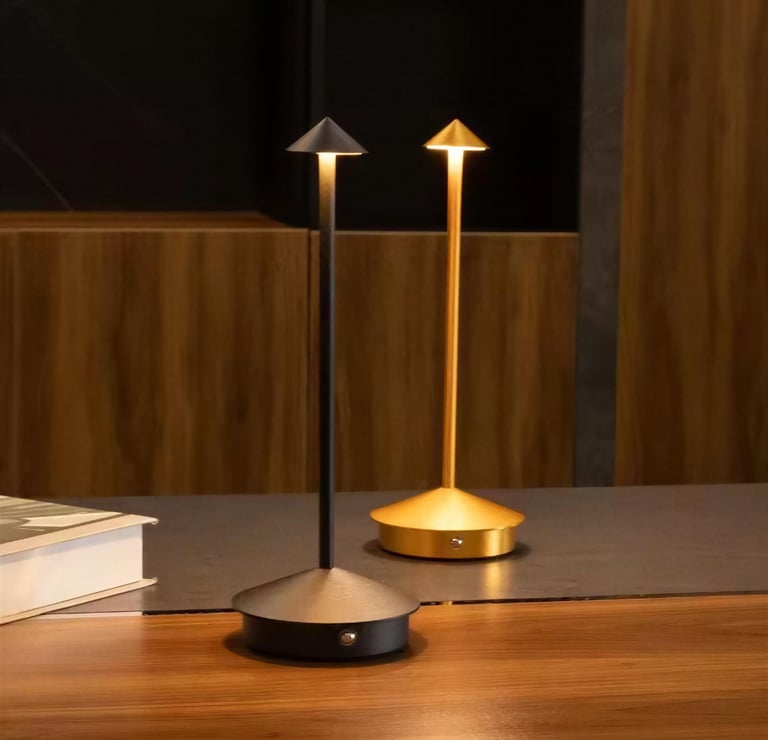 Rechargeable table lamp in a small cozy bedroom reading nook
