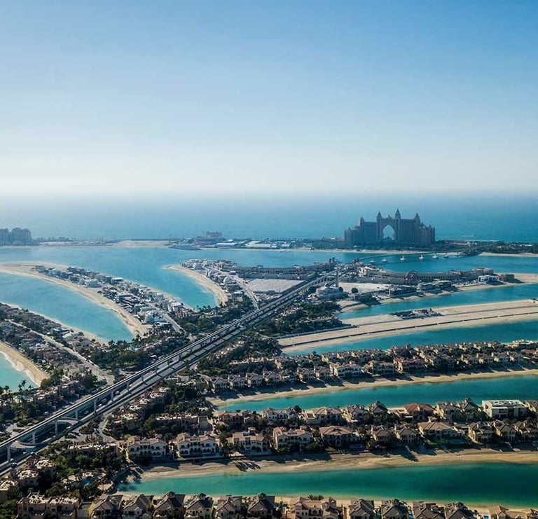 Aerial view of Palm Jumeirah Dubai with luxury waterfront villas and Atlantis The Palm