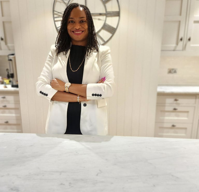 a woman in a white jacket and black pants