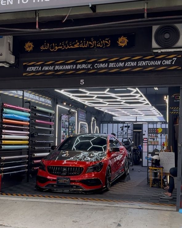 Mercedes CLA AMG wrapped in custom spiderweb design at One 7 Garage
