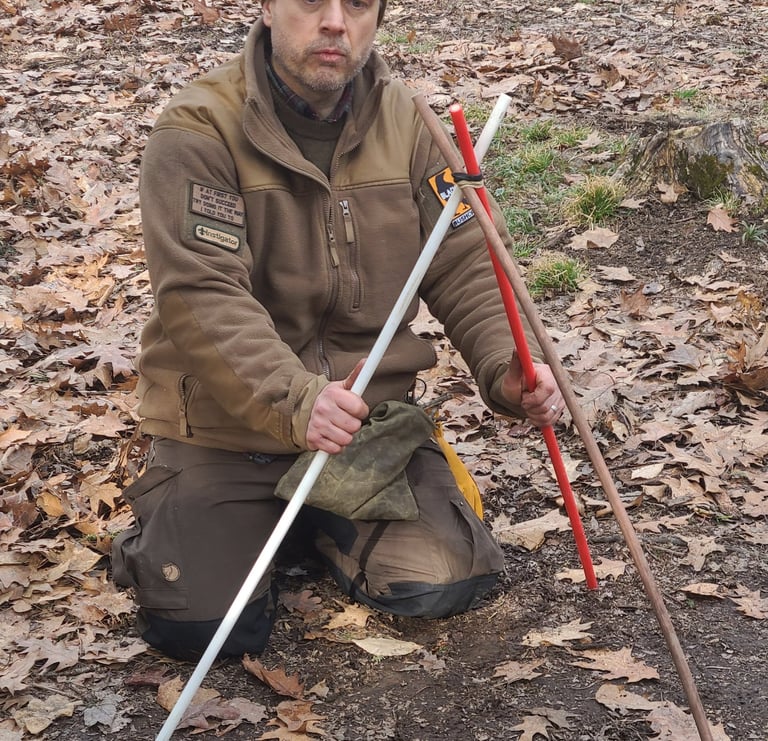 Instructor explaining the three components for fire making.