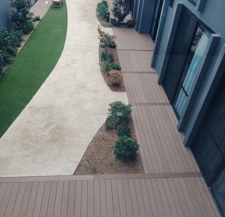 Low level composite deck boards