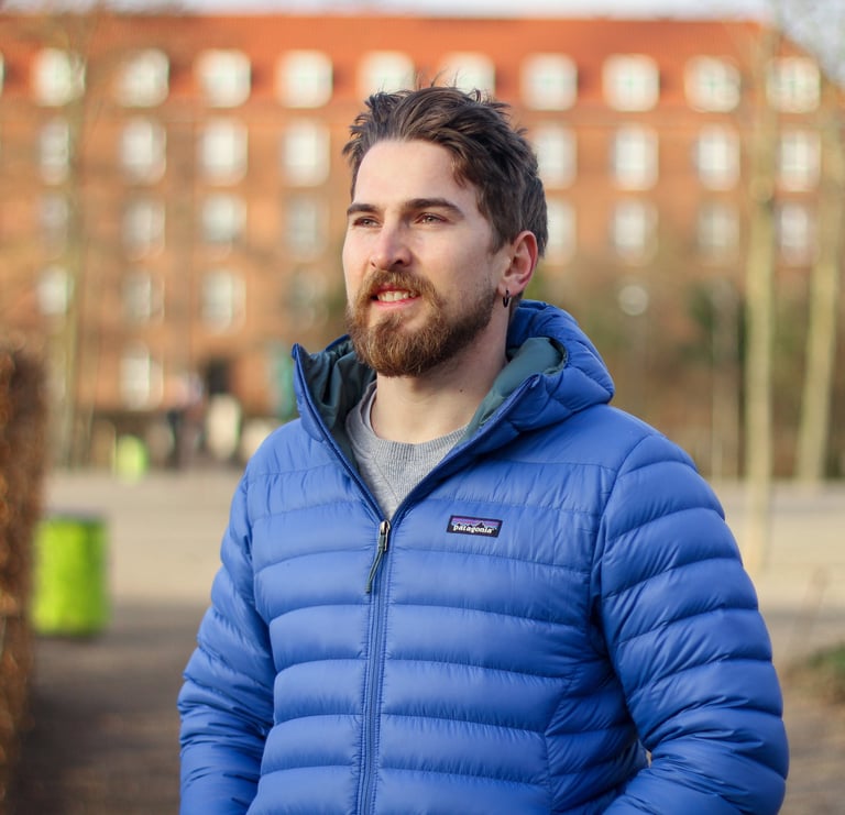 the blog owner with a blue jacket portrait