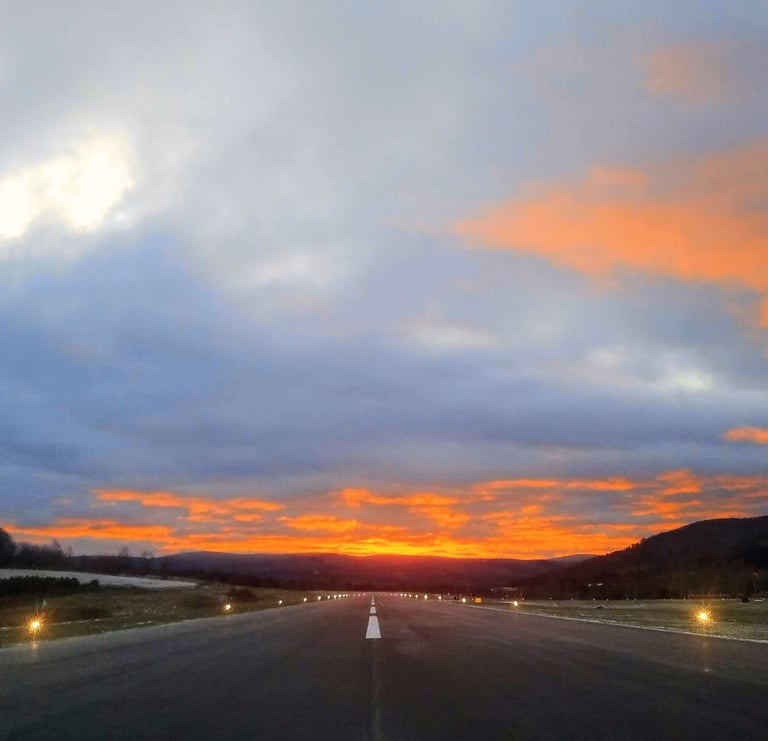 Sunrise from the end of runway 13 at the Bennington Airport