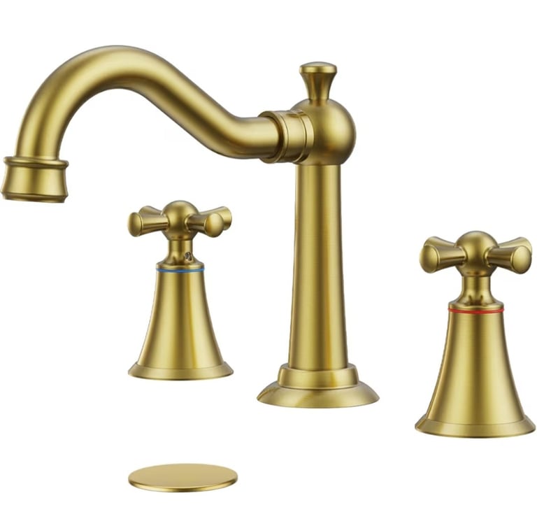 Brushed gold three-hole widespread bathroom faucet with classic cross handles.
