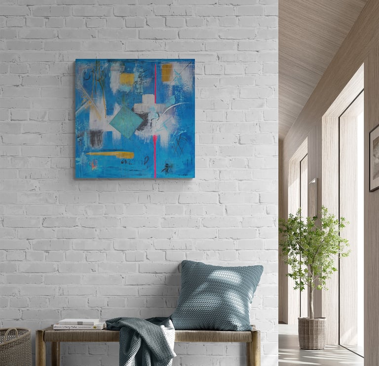 Blue artwork with teal and pink above boho bench