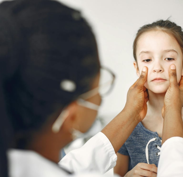 a girl with a doctor's eye patch on her face