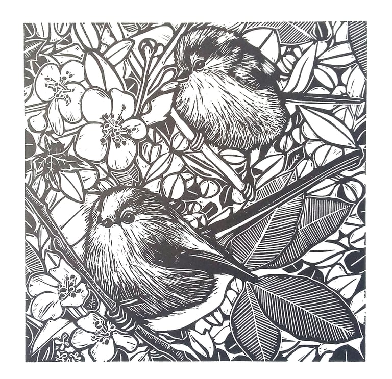 hand printed lino print of two longtail tits in a hedge by carolynne coulson