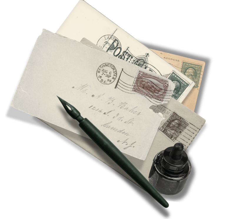 Old envelopes with old stamps, calligraphy pen and bottle ink