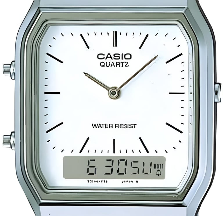Casio vintage stainless steel watch with a white analog face and small digital display.