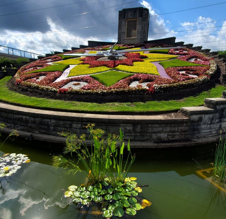 A picture of the flower clock under a partly cloudy sky.