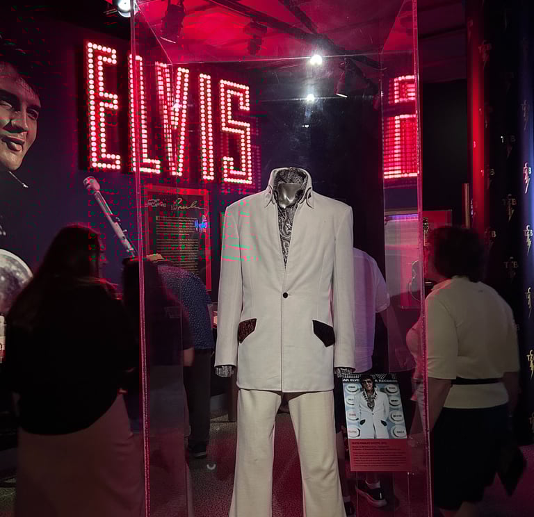 A picture of the Rock and Roll Hall of Fame exhibit for Elvis.