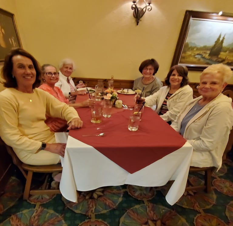 A picture of people sitting at a table.