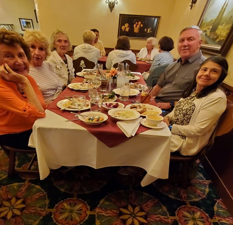 A picture of people sitting at a table.