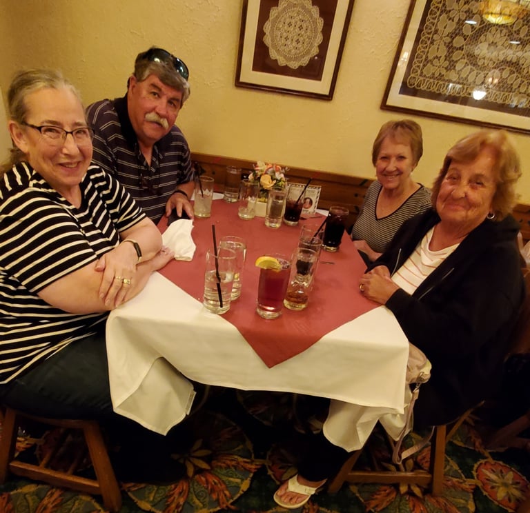A picture of people sitting at a table.