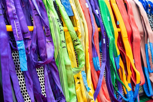 soft slings being laid out and inspected