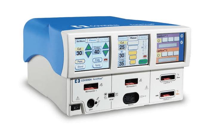 a medical device with a blue and white machine