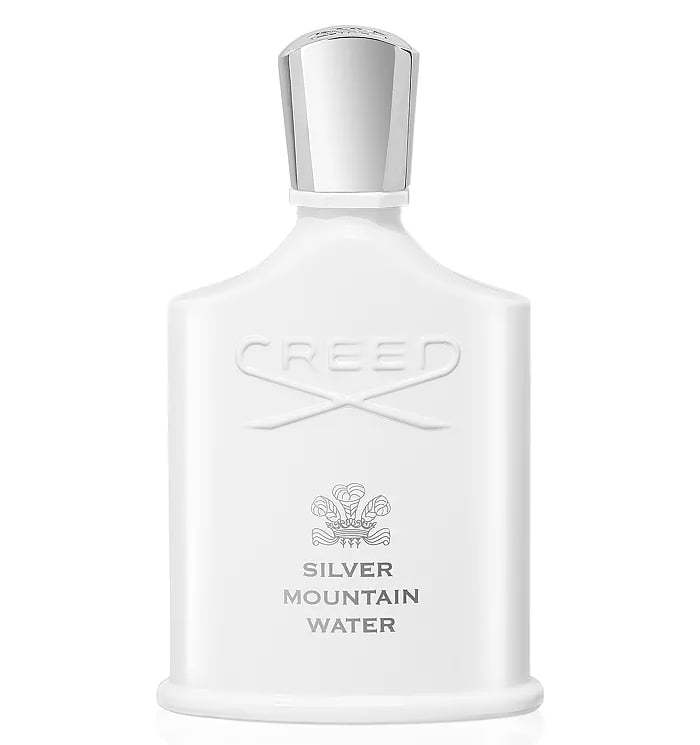 Creed Silver Mountain Water perfume bottle in opaque white with a silver cap.