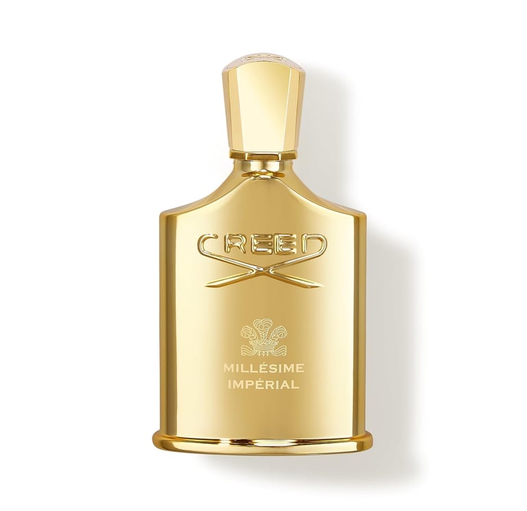 Creed Millésime Impérial luxury fragrance in an iconic gold bottle, high-end designer cologne for men and women.