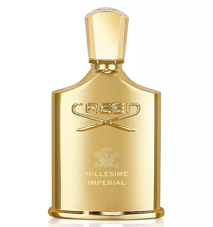 Luxurious gold Creed Millésime Impérial fragrance bottle with an elegant embossed logo.