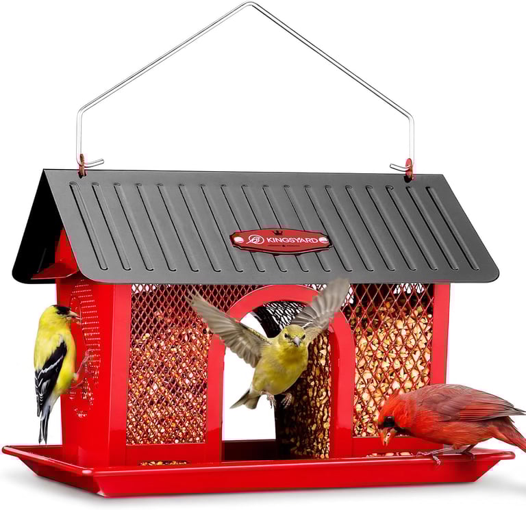 Red metal bird feeder with a cardinal and finches eating from a mesh seed container.