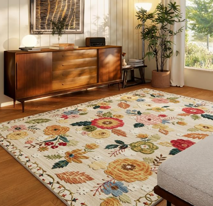 large floral cream color rug filled with colorful zinna flowers and green leaves