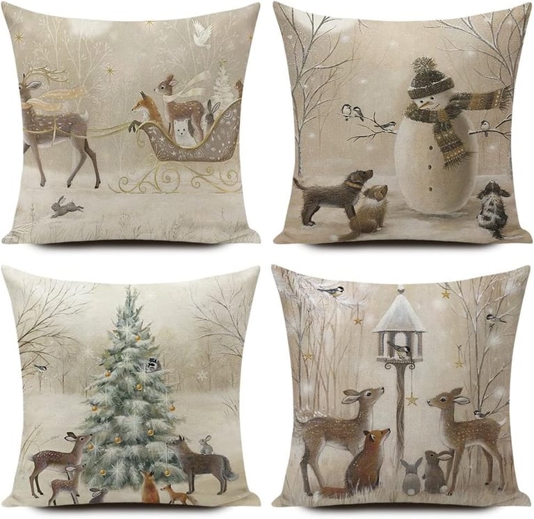 a set of four pillows with a snowman in the background