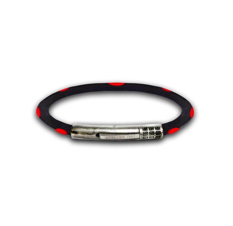 black bracelet with red polka dots