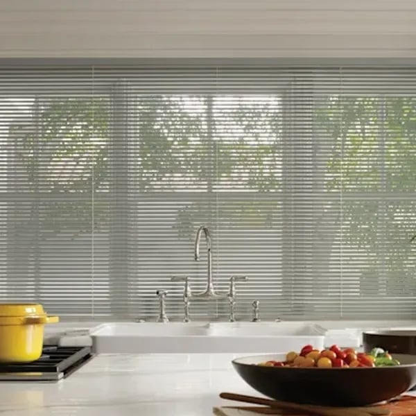 kitchen sink with modern aluminum blinds and bright natural light – Rise Up Window Coverings Milwaukee