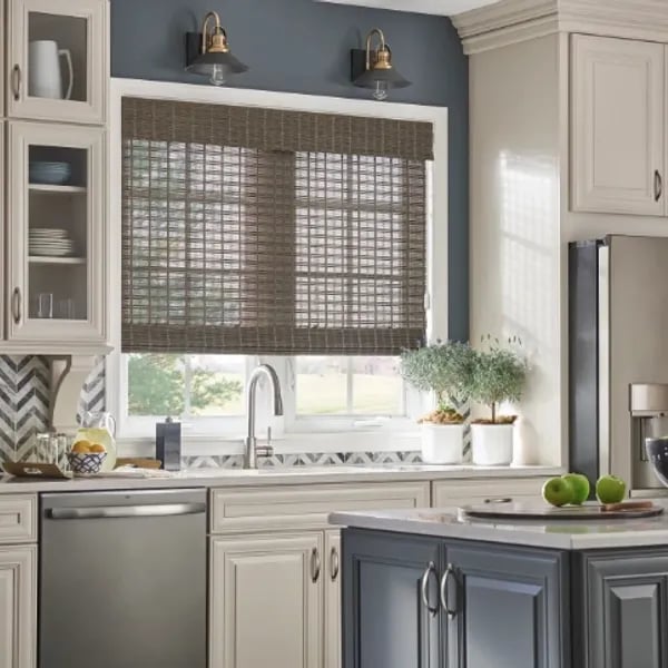 kitchen with woven wood shades above sink and modern cabinetry – Rise Up Window Coverings Milwaukee