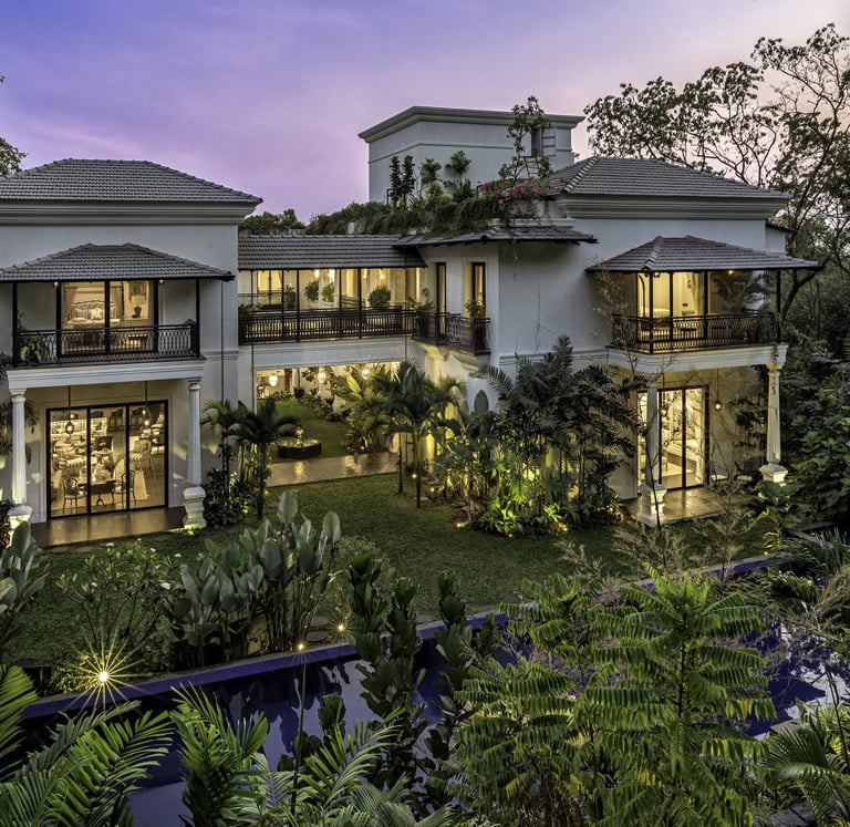 a house with a large garden and a pool