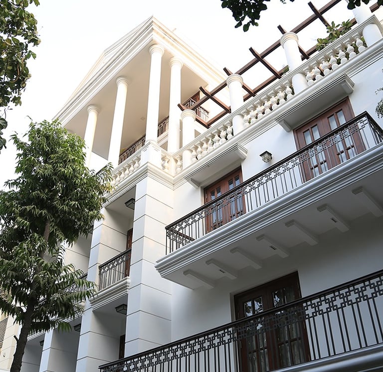 a building with a balcony and balcony railings