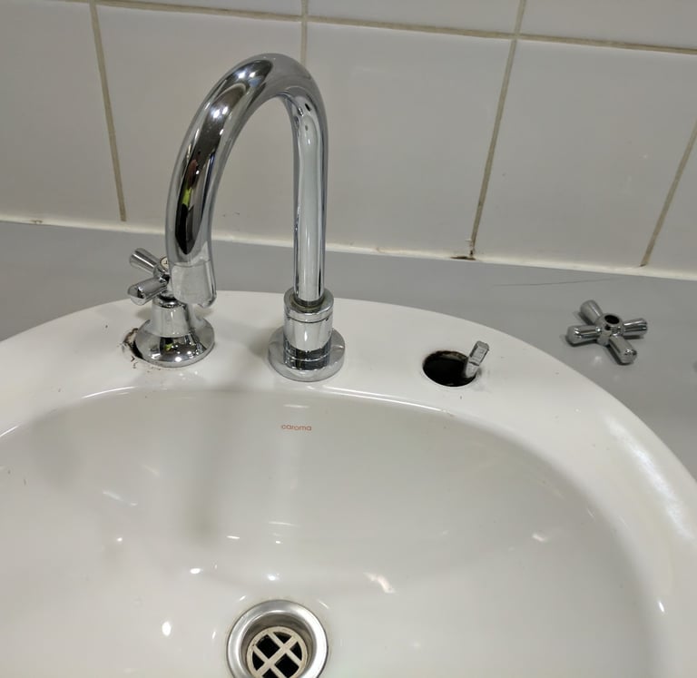 broken basin mixer tap