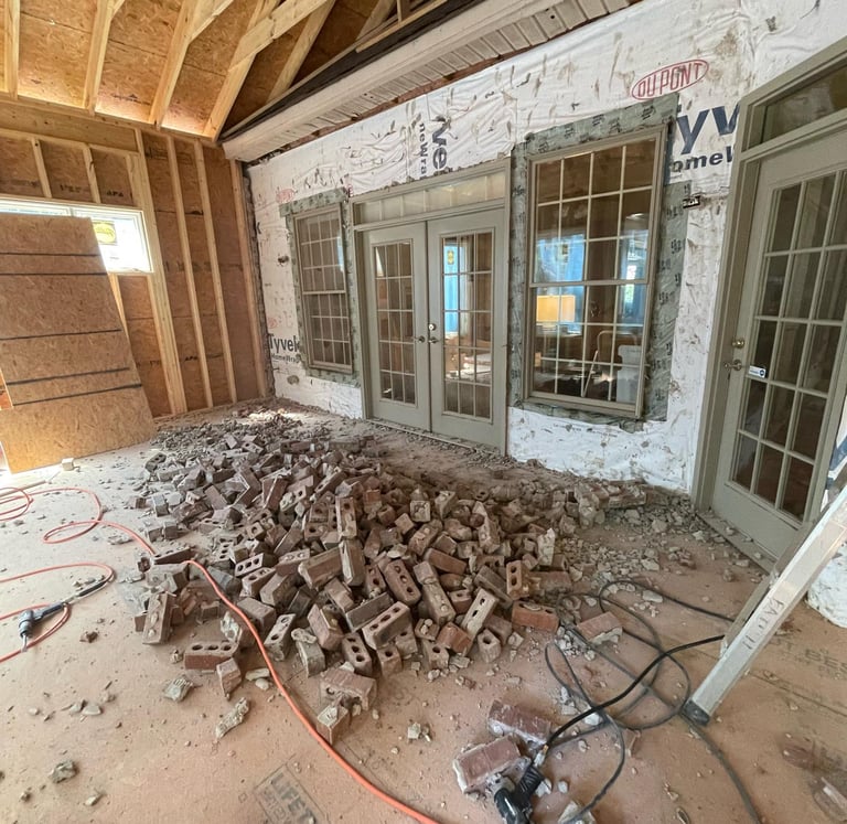 demolition-services-on-a-brick-wall