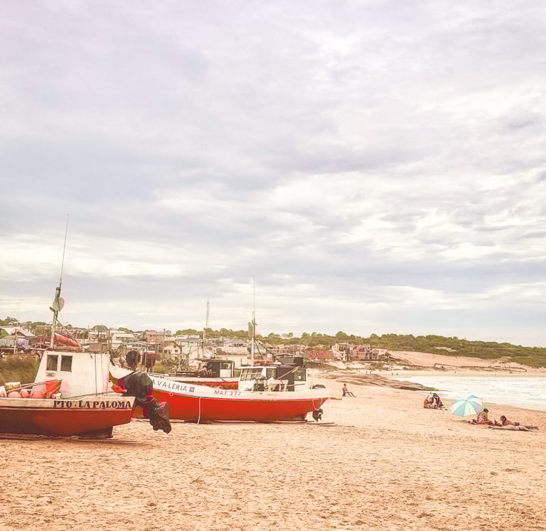 Boats on the beach in Punta Del Diablo in Uruguay
