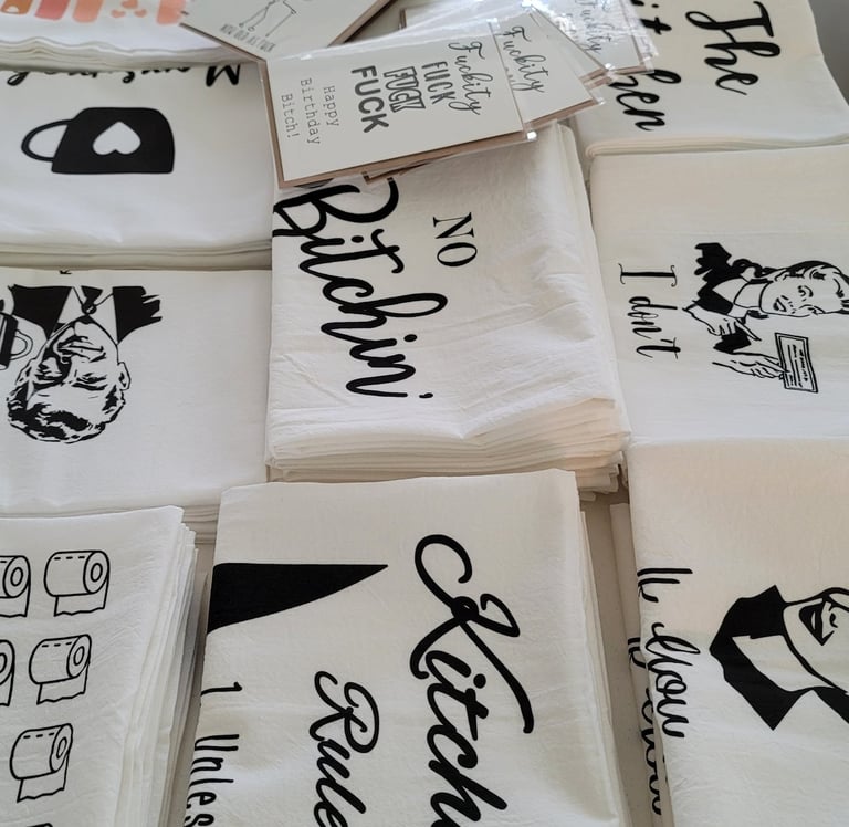 Several of out tea towels layed out