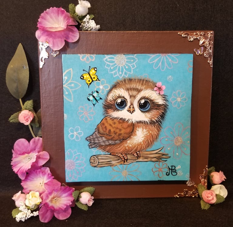Painting of cute furry owl with flower background and butter flies.