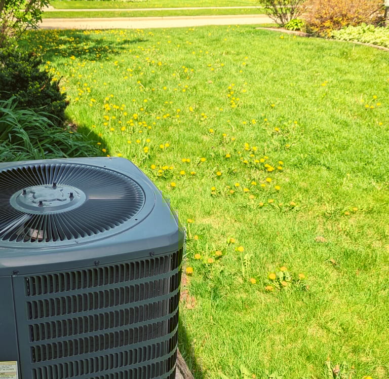 AC installed at a home in Richfield helps to cut the household humidity in the summer heat.