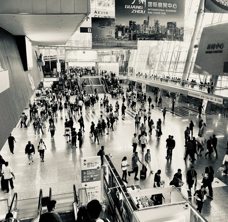 a crowded trade hub with people walking around