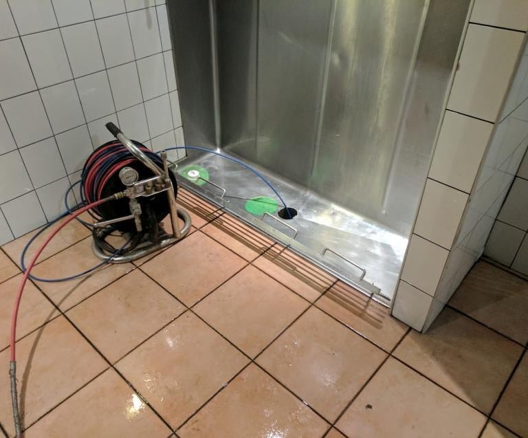 Unblocking a urinal in Dromana