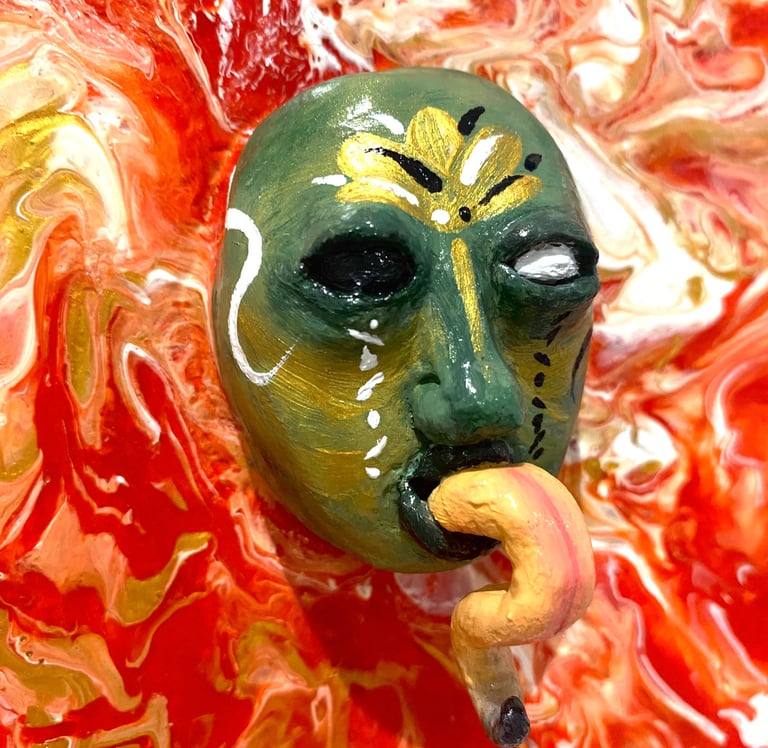 une sculpture avec une longue langue qui émerge d'un tableau rouge vu de près