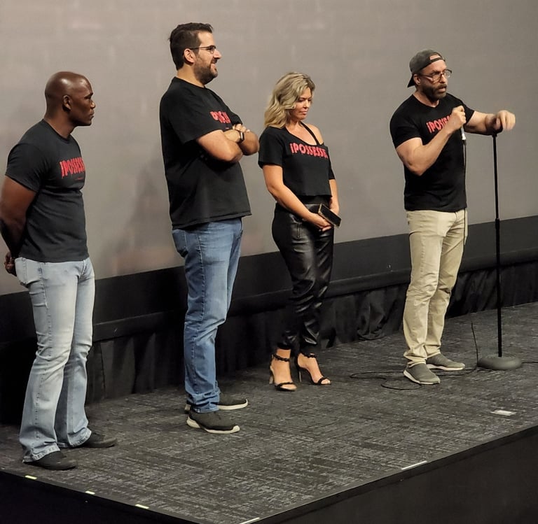 a group of people standing on a stage