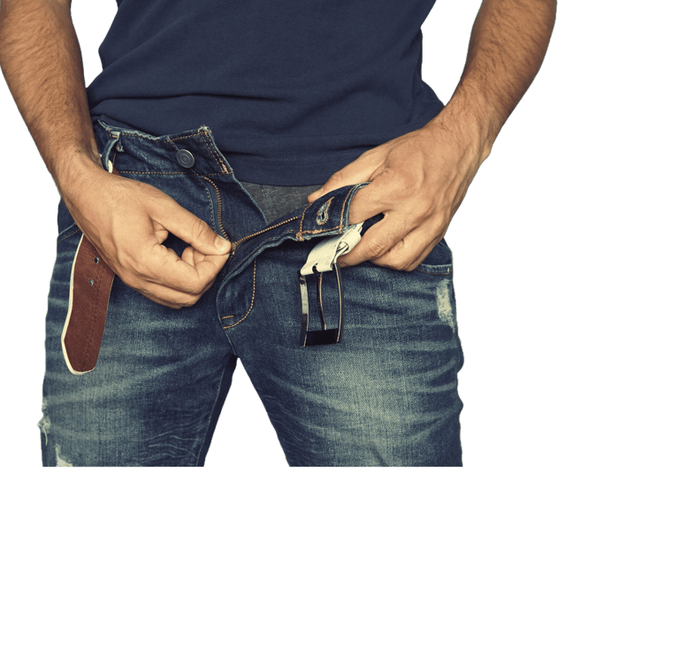 Front view photo of a light skinned man unzipping his jeans