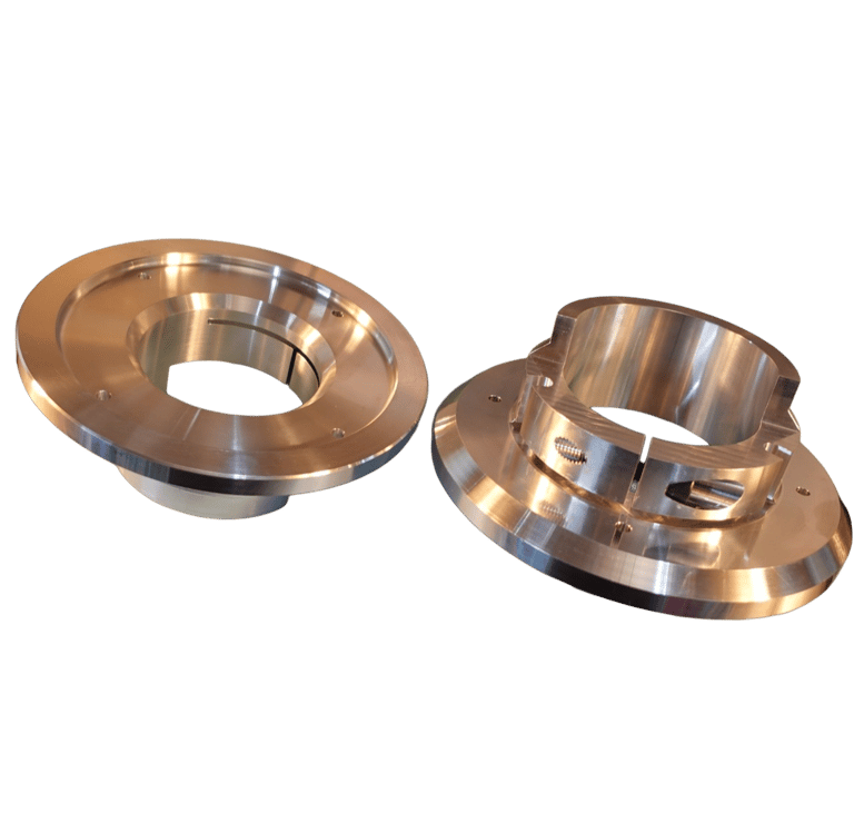 Pair of precision-machined aluminum industrial couplings for mechanical engineering.