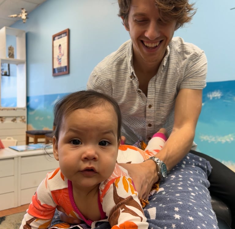 Franklin chiropractor adjusting baby for tongue tie, natural relief