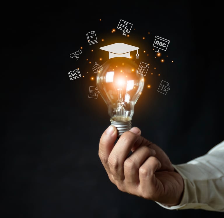Illuminated lightbulb with a school graduation cap and other icons of learning floating around it